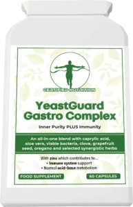 Slight top-view of the flat white bottle showing snap-cap and full front label; title prominent with green border, leaf background, formulation band, and zinc contribution statements; bottom markers “Food Supplement” and “60 Capsules”.